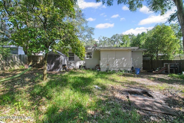 950 Ashton St, Jacksonville, FL 32208 - fenced backyard with a shed