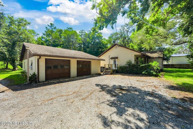 1331 Sheffield Rd, Saint Johns, FL 32259 - ranch-style house with a garage and an outbuilding