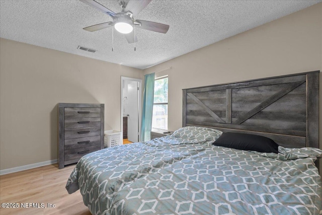 1331 Sheffield Rd, Saint Johns, FL 32259 - bedroom featuring wood finished floors, a textured ceiling, and a ceiling fan