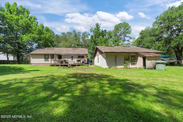 1331 Sheffield Rd, Saint Johns, FL 32259 - rear view of property with a wooden deck and a yard