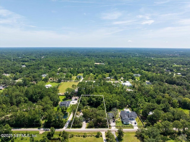1331 Sheffield Rd, Saint Johns, FL 32259 - aerial view of property and surrounding area featuring a heavily wooded area and property parcel outlined