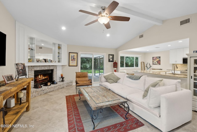 106 Poseidon Ln, Ponte Vedra Beach, FL 32082 - living area featuring a brick fireplace, a ceiling fan, recessed lighting, and light tile patterned floors