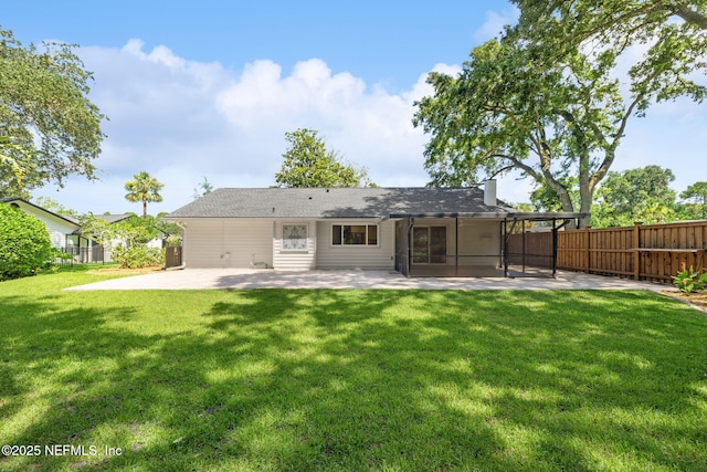 106 Poseidon Ln, Ponte Vedra Beach, FL 32082 - rear view of house featuring a patio area, a fenced backyard, a chimney, and a sunroom