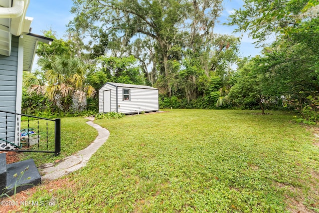 363 W 63rd St, Jacksonville, FL 32208 - view of green lawn featuring a shed