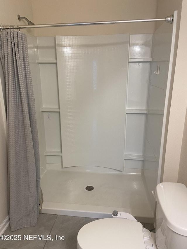 86568 Shortline Cir, Yulee, FL 32097 - bathroom with a stall shower and tile patterned flooring