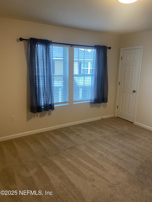 86568 Shortline Cir, Yulee, FL 32097 - carpeted empty room with baseboards