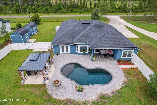 75652 Edwards Rd, Yulee, FL 32097 - view of pool featuring a gazebo, a fenced backyard, french doors, and a patio area