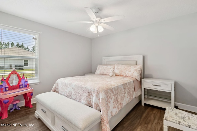 75652 Edwards Rd, Yulee, FL 32097 - bedroom with dark wood-style flooring and a ceiling fan