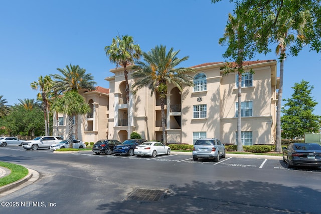 13846 Atlantic Blvd Unit 103, Jacksonville, FL 32225 - view of building exterior with uncovered parking