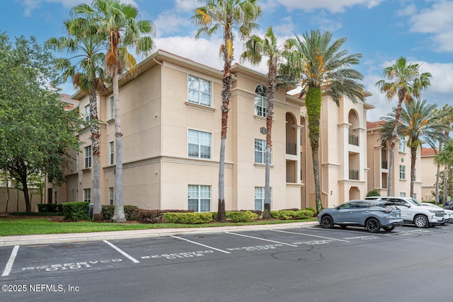 13846 Atlantic Blvd Unit 103, Jacksonville, FL 32225 - view of property with uncovered parking