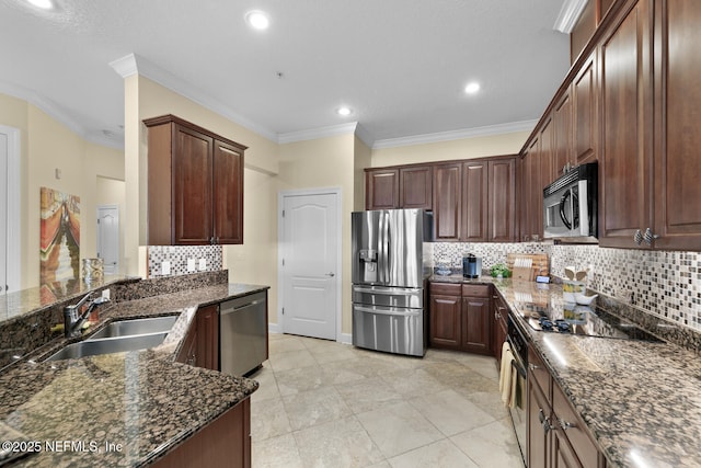 13846 Atlantic Blvd Unit 103, Jacksonville, FL 32225 - kitchen featuring appliances with stainless steel finishes, ornamental molding, tasteful backsplash, dark stone counters, and recessed lighting