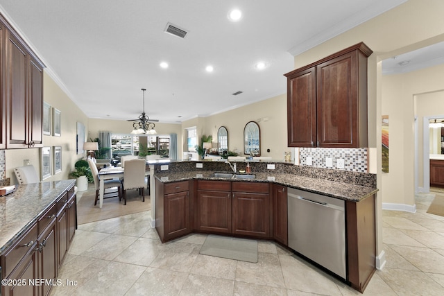 13846 Atlantic Blvd Unit 103, Jacksonville, FL 32225 - kitchen with dishwasher, crown molding, backsplash, a peninsula, and dark stone counters