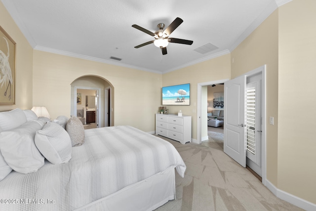 13846 Atlantic Blvd Unit 103, Jacksonville, FL 32225 - bedroom with arched walkways, crown molding, light colored carpet, ceiling fan, and ensuite bath