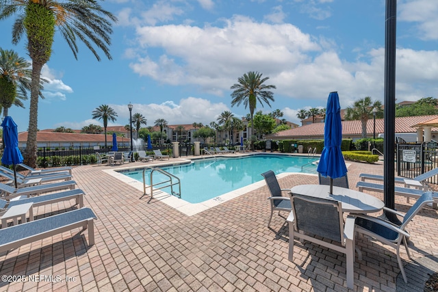 13846 Atlantic Blvd Unit 103, Jacksonville, FL 32225 - community pool featuring a patio area
