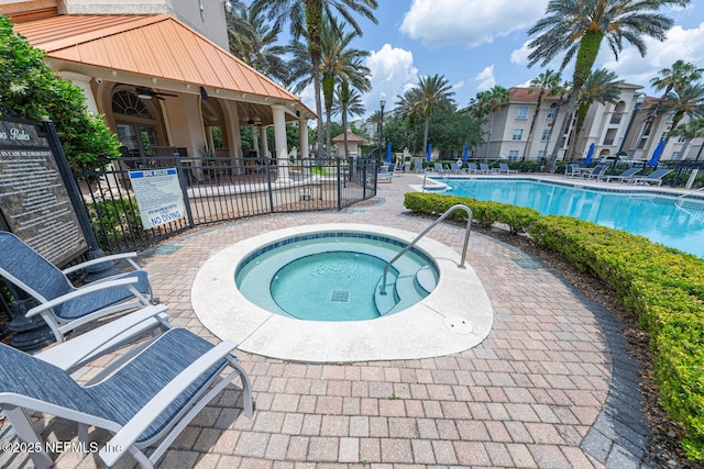 13846 Atlantic Blvd Unit 103, Jacksonville, FL 32225 - community pool with a community hot tub, a patio, and ceiling fan