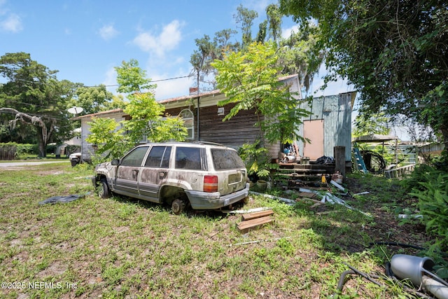 96 Bruen St, Saint Augustine, FL 32084 - view of side of home featuring a lawn