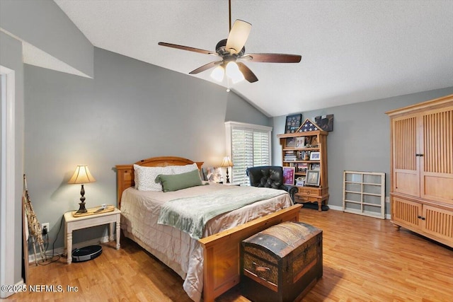 101 Duck Bill Cv, Ponte Vedra Beach, FL 32082 - bedroom with vaulted ceiling, wood finished floors, and a ceiling fan