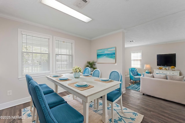 103 Chapin St, Saint Augustine, FL 32084 - dining area with crown molding and wood finished floors