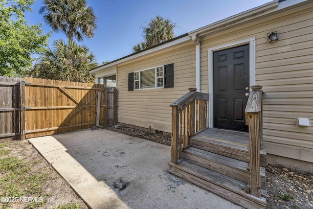 103 Chapin St, Saint Augustine, FL 32084 - doorway to property with a gate and a patio