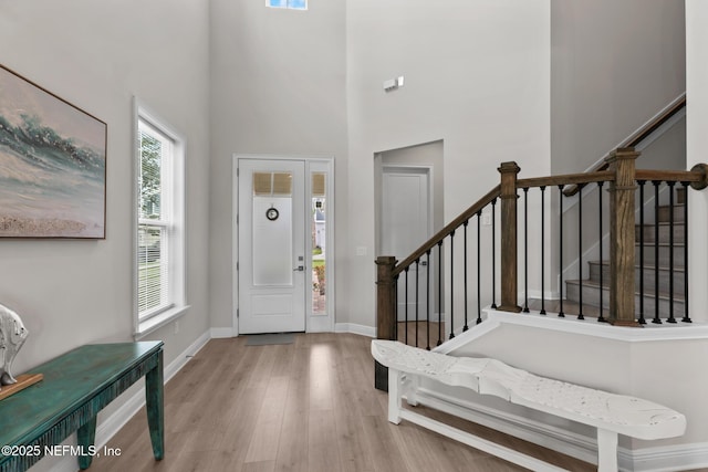 106 Rum Runner Way, Saint Johns, FL 32259 - entrance foyer with wood finished floors, stairway, and a high ceiling