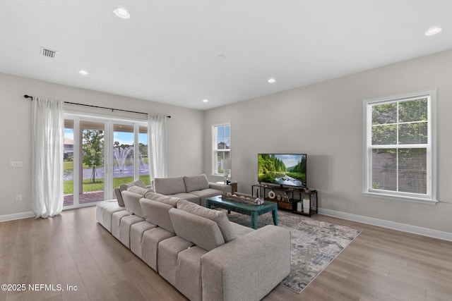 106 Rum Runner Way, Saint Johns, FL 32259 - living room with wood finished floors, healthy amount of natural light, and recessed lighting