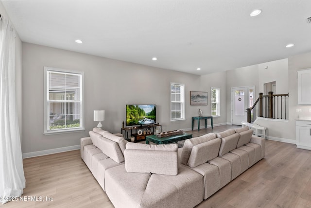 106 Rum Runner Way, Saint Johns, FL 32259 - living room with light wood-style flooring, recessed lighting, and stairway