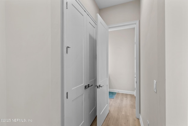 106 Rum Runner Way, Saint Johns, FL 32259 - hallway with light wood-style floors and baseboards