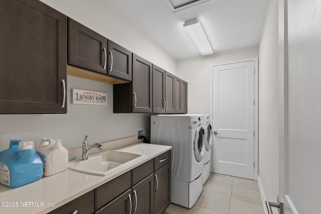 106 Rum Runner Way, Saint Johns, FL 32259 - washroom featuring cabinet space, washing machine and clothes dryer, light tile patterned floors, and a textured ceiling
