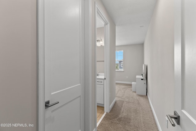 106 Rum Runner Way, Saint Johns, FL 32259 - hallway featuring light colored carpet and baseboards