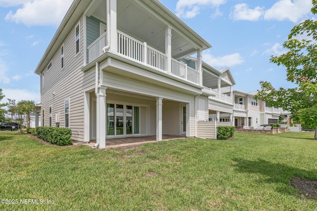 106 Rum Runner Way, Saint Johns, FL 32259 - back of property with a balcony and a lawn