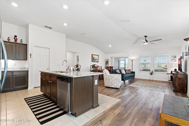 20 Willow St, Palm Coast, FL 32164 - kitchen featuring stainless steel dishwasher, a ceiling fan, dark brown cabinets, open floor plan, and recessed lighting