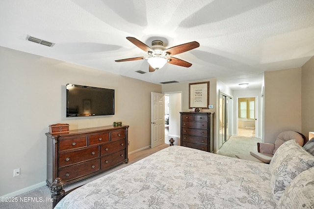 4251 Monument Rd Unit 805, Jacksonville, FL 32225 - bedroom with carpet floors, ensuite bathroom, and a ceiling fan