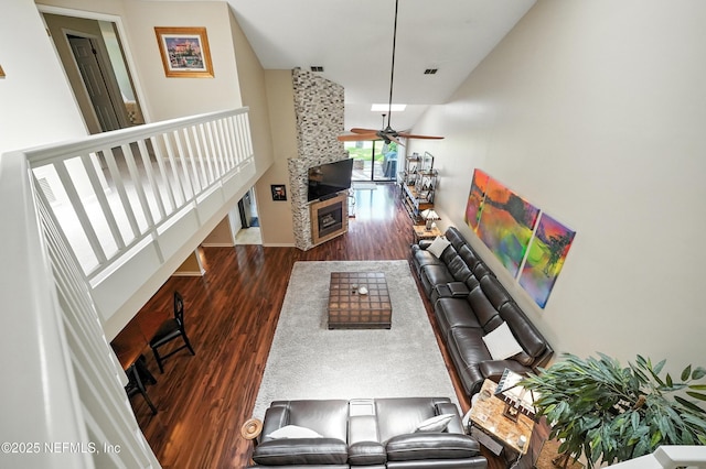 4251 Monument Rd Unit 805, Jacksonville, FL 32225 - living room featuring a ceiling fan, wood finished floors, and a fireplace