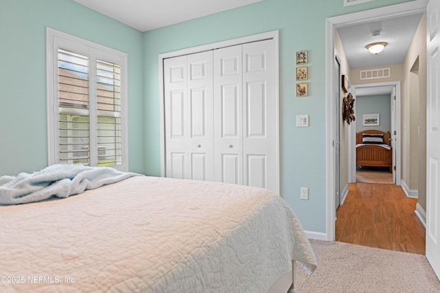 96740 Quartz Ln, Yulee, FL 32097 - carpeted bedroom with a closet and baseboards