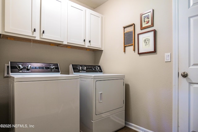 96740 Quartz Ln, Yulee, FL 32097 - laundry room featuring cabinet space and washing machine and dryer