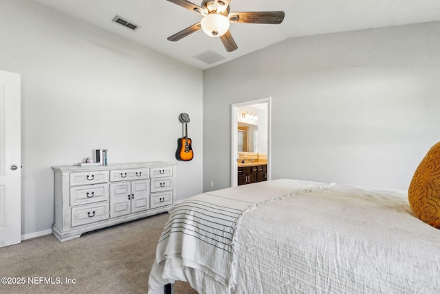 95297 Windflower Trl, Fernandina Beach, FL 32034 - carpeted bedroom featuring vaulted ceiling, a ceiling fan, and ensuite bath