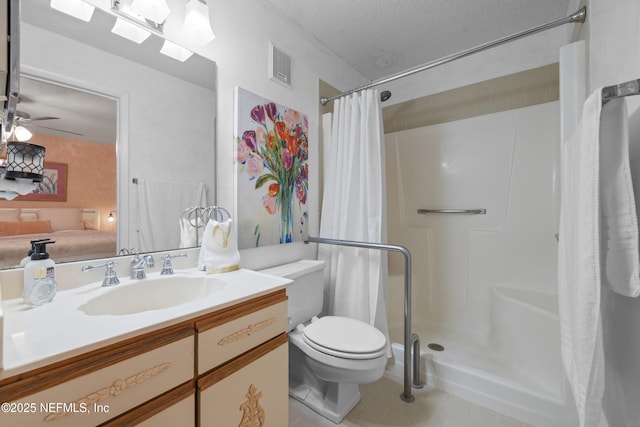 1071 Edgewood Ave S Unit 407, Jacksonville, FL 32205 - full bath featuring tile patterned floors, vanity, a stall shower, a textured ceiling, and a ceiling fan