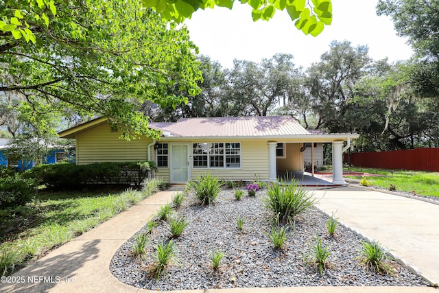 5299 County Road 352nd Rd, Keystone Heights, FL 32656 - view of front of property featuring driveway, a carport, and a metal roof