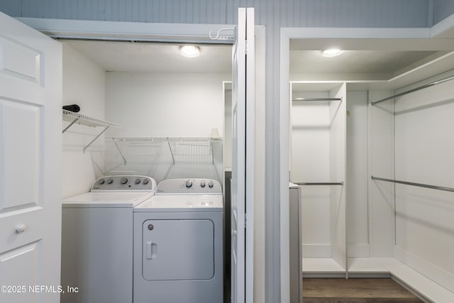 5299 County Road 352nd Rd, Keystone Heights, FL 32656 - laundry area featuring dark wood finished floors and washing machine and clothes dryer
