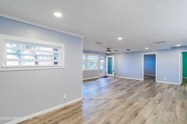 5299 County Road 352nd Rd, Keystone Heights, FL 32656 - empty room featuring light wood-type flooring, recessed lighting, ceiling fan, a textured ceiling, and crown molding