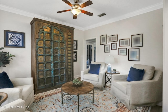 1805 Commodore Point Dr, Fleming Island, FL 32003 - living area featuring a ceiling fan, ornamental molding, and wood finished floors