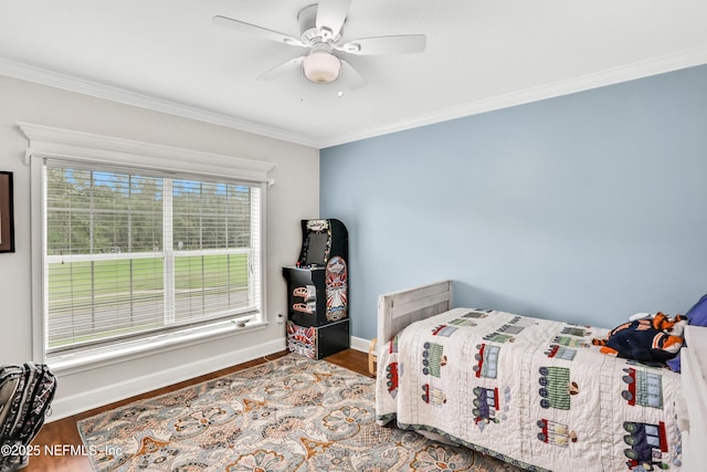 1805 Commodore Point Dr, Fleming Island, FL 32003 - bedroom featuring crown molding, wood finished floors, and ceiling fan
