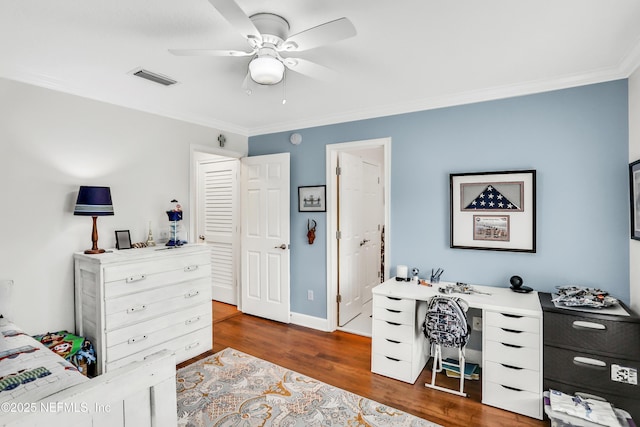 1805 Commodore Point Dr, Fleming Island, FL 32003 - bedroom featuring ornamental molding, dark wood-style floors, and ceiling fan