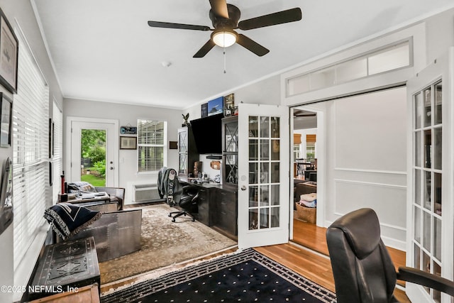 1805 Commodore Point Dr, Fleming Island, FL 32003 - home office with french doors, ceiling fan, wood finished floors, and a wall mounted air conditioner