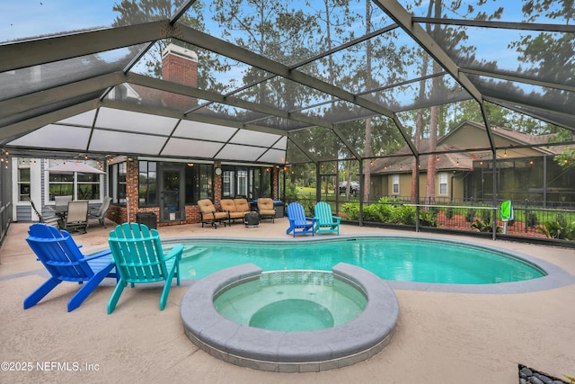 1805 Commodore Point Dr, Fleming Island, FL 32003 - view of pool featuring an outdoor hangout area, a patio, a pool with connected hot tub, and glass enclosure