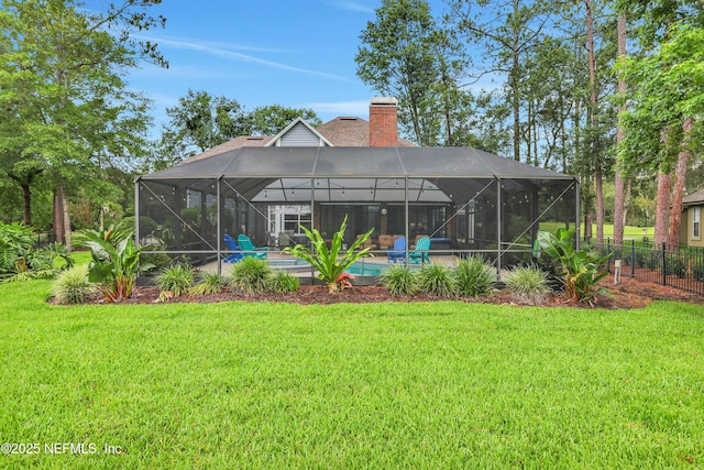 1805 Commodore Point Dr, Fleming Island, FL 32003 - back of house featuring a chimney, a patio, and glass enclosure