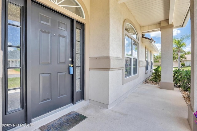 1069 Ardmore St, Saint Augustine, FL 32092 - property entrance with stucco siding