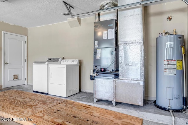 1069 Ardmore St, Saint Augustine, FL 32092 - laundry area featuring water heater, independent washer and dryer, a textured ceiling, and heating unit