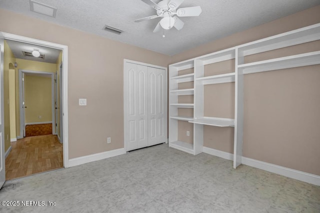1069 Ardmore St, Saint Augustine, FL 32092 - unfurnished bedroom with a textured ceiling and ceiling fan