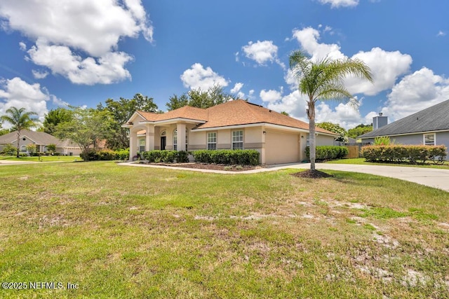 1069 Ardmore St, Saint Augustine, FL 32092 - mediterranean / spanish home with concrete driveway, a garage, and stucco siding